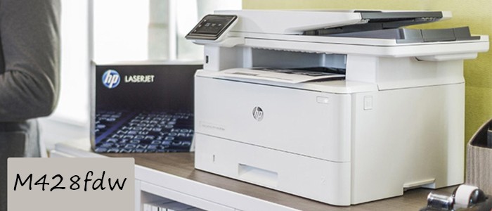 پرینتر لیزری اچ پی Laserjet Pro M428fdw روی میز